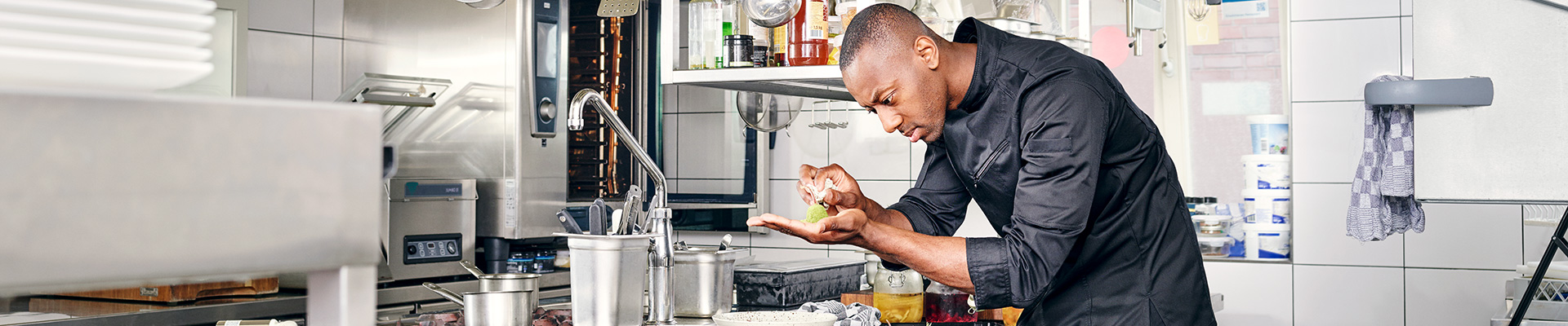 Anthony Sarpong is preparing food in the kitchen.